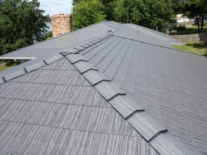 Close up aerial shot of a gray metal roof