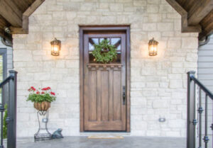 Entryway with wood door and stone